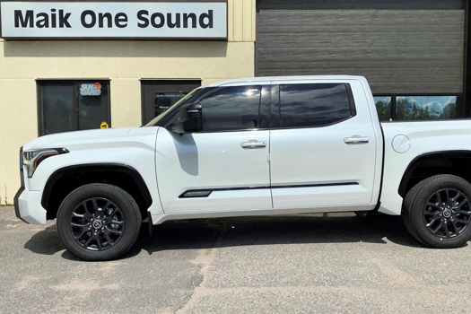 Tinted Truck in front of Local Shop